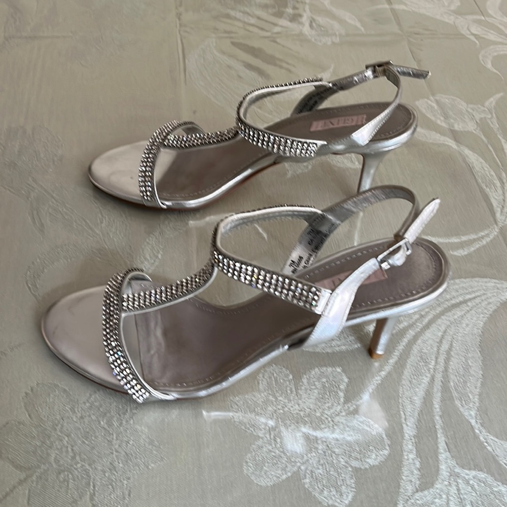 Gently worn silver strappy shoe, small diamonds on straps, 3 “ leather heal